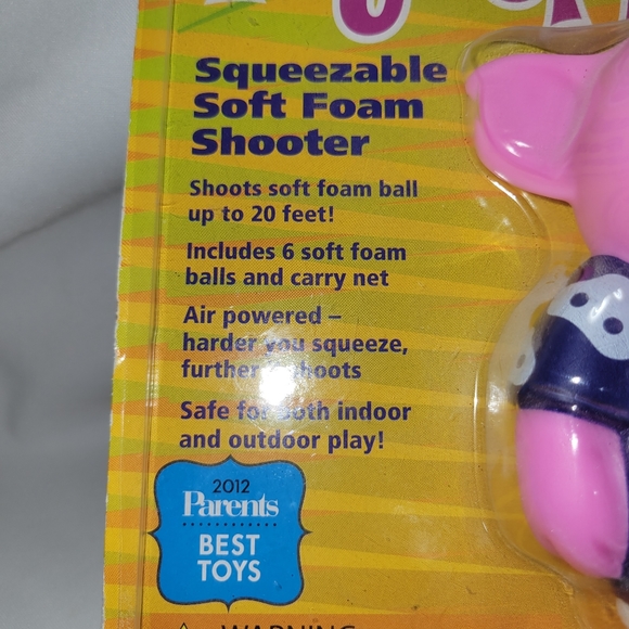 Pig Popper Squeezeble Foam ball soft shooter comes w/6 balls NIB - Picture 4 of 4